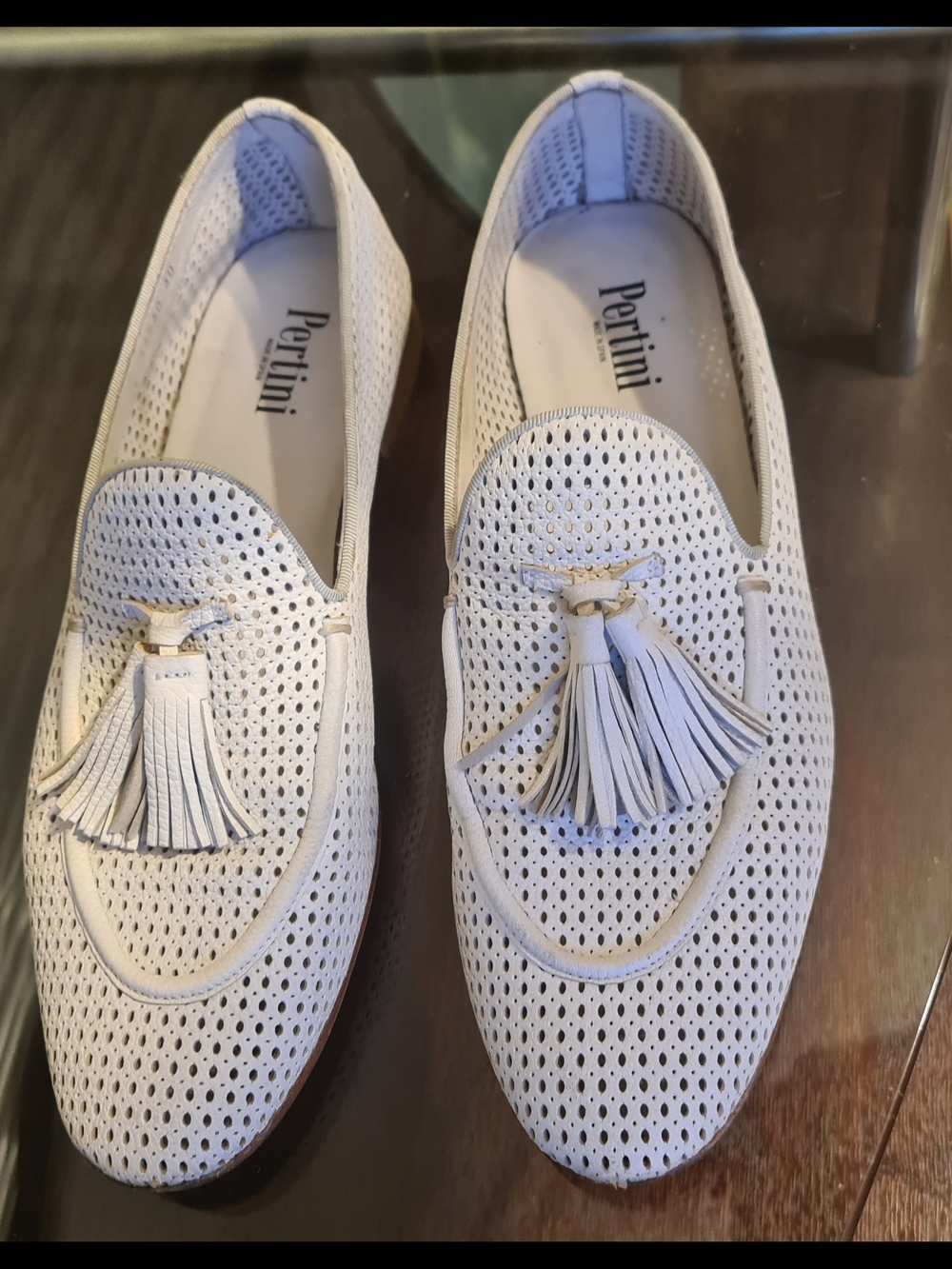 Pertini Perforated Tassel Loafers in White Leather
